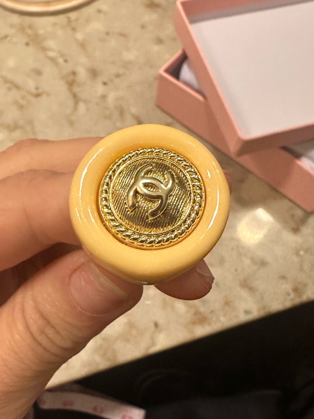CHANEL Yellow Resin Ring with Gold CC Medallion Accent